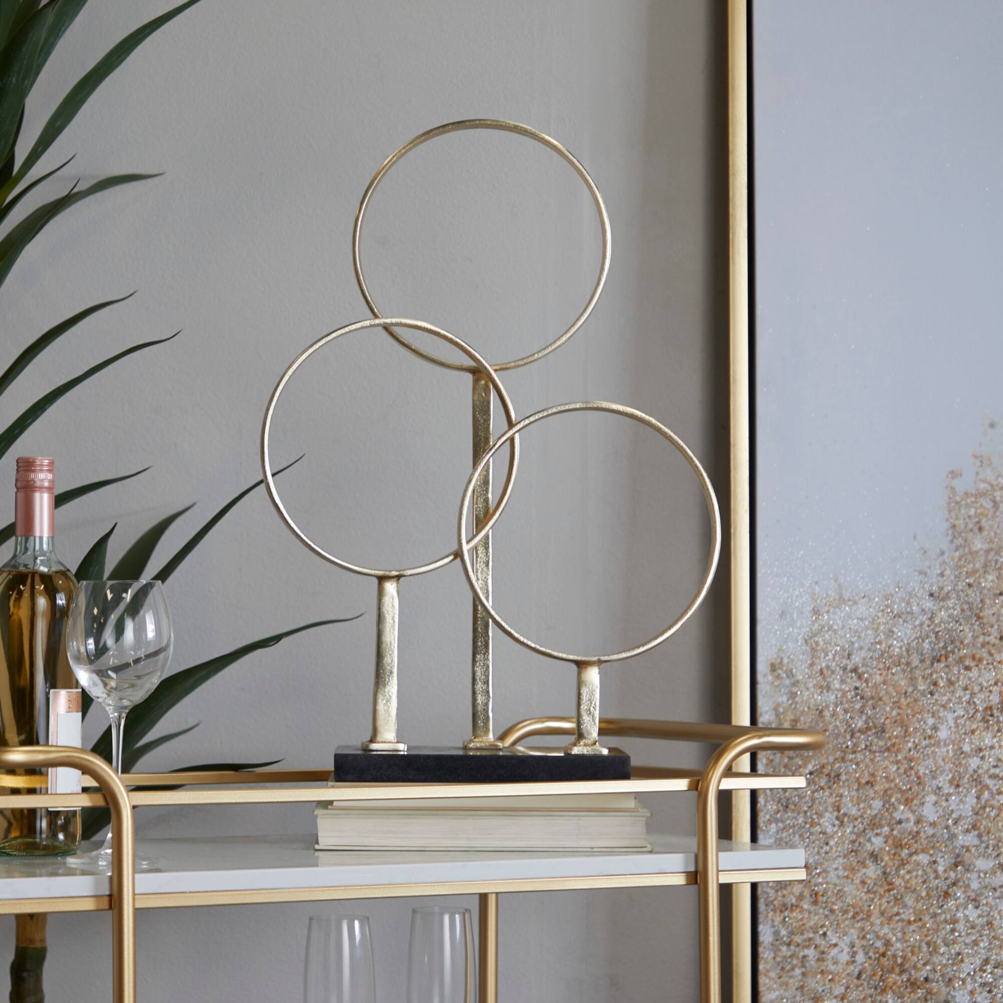 CosmoLiving by Cosmopolitan 21" Gold Aluminum 3-Rings Abstract Sculpture with Black Base